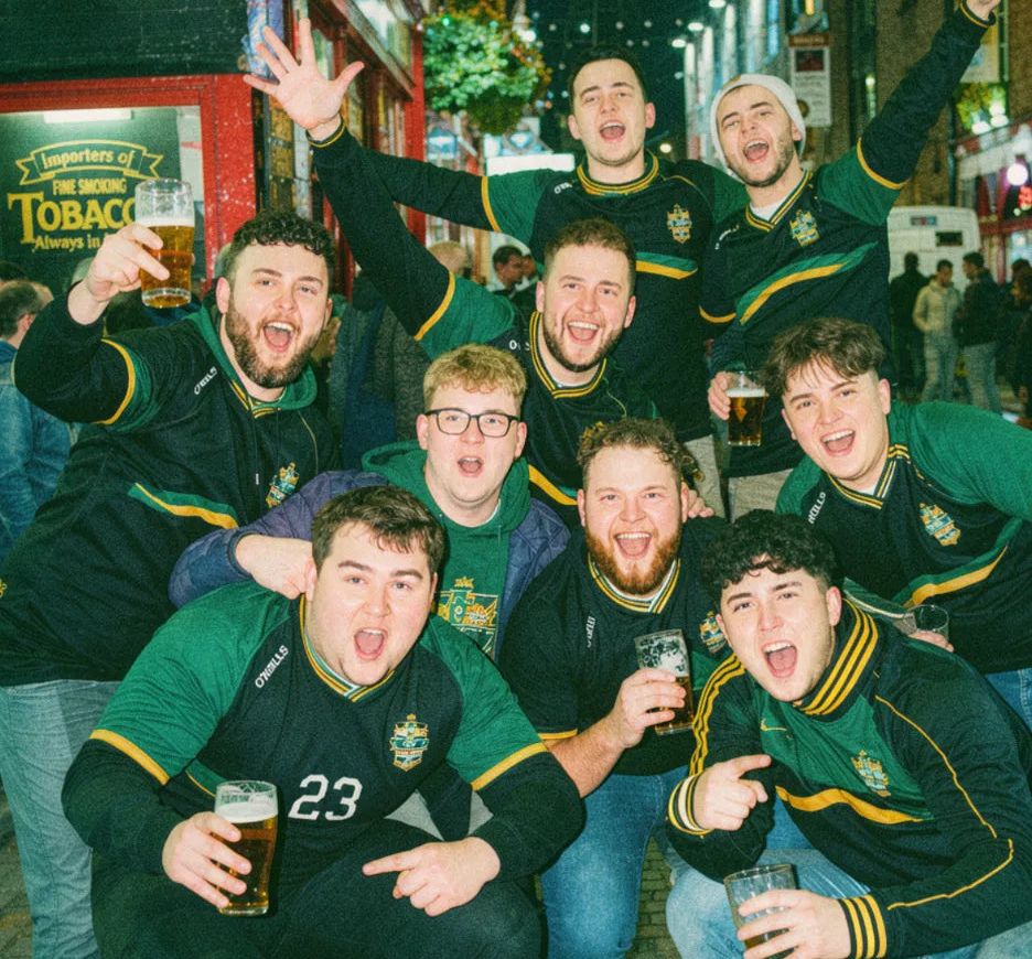 Pub golf team in a huddle together during a night out