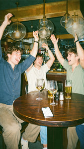 Pub golf team celebrating together at the end of their route