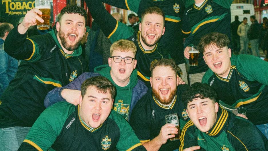 Pub golf team in a huddle together during a night out